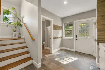 Back area landing space- mudroom/laundry & 3/4 bath.