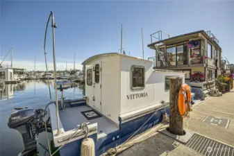 This houseboat is 20' X 10' and can stay in this slip or be moved to you dock as an office or guest house.