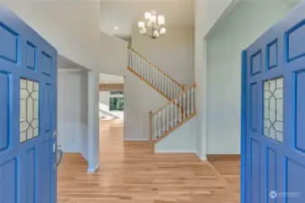 Enter the foyer on to freshly refinished hardwood floors and new paint throughout the entire home.