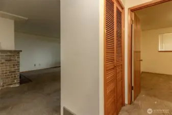 View from the primary bedroom of the hallway storage closet.  There are 2 large closets.