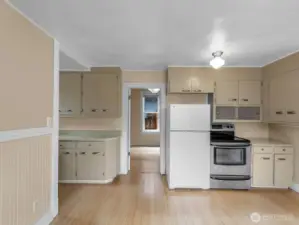 You could flip this adorable 2 bedroom/1 bath cottage, then live in it while you convert addtional structure into a DADU for added investment value