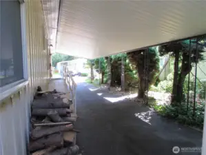 FULL LENGTH CARPORT OFF FRONT ENTRY