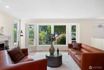 sun filled living room with bay window
