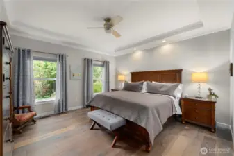 The main-floor primary suite is a haven of tranquility.
