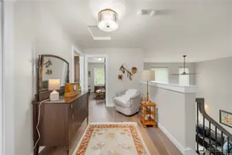 The upstairs landing can be a private sitting area, or add a desk for a convenient work area.