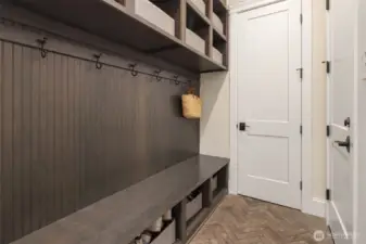 Drop your bags, kick off your shoes, and hide the chaos in style—this chic mudroom is built to handle real life, beautifully.
