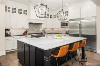A kitchen designed with real life in mind—starting with the oversized fridge that’s ready for Costco hauls, lunchbox prep, and midnight snack runs. Form meets function in the heart of the home.