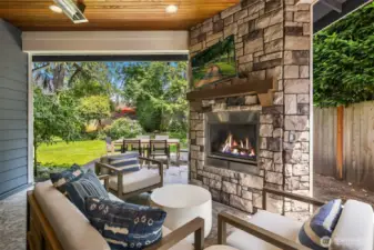 S'mores by firelight, game day on the outdoor TV, and dinner al fresco—this covered patio brings the vacation vibes home, rain or shine.