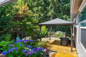 Multi tiered deck to enjoy this beautiful yard!