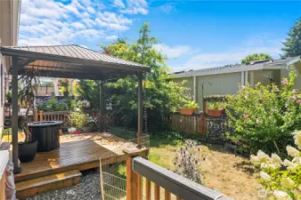 Another view of the yard area and lower level deck.