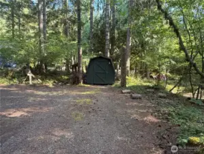 Good size outbuilding w/ shelving.