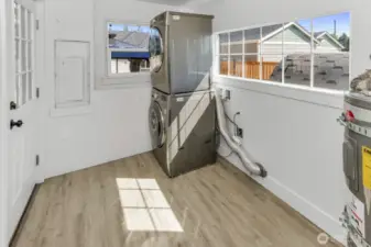 Laundry room off of kitchen.