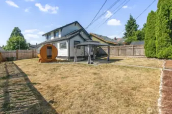 View of back of the home and sauna that will be staying.