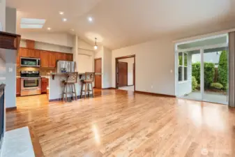 Slider to covered patio and den office off great room