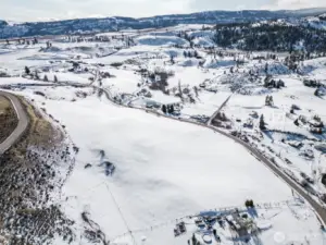 Surrounded by rolling hills.