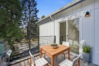 Virtually staged patio off the primary