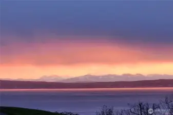 Ever changing Puget Sound and Cascade Mountain views delight from almost every window.