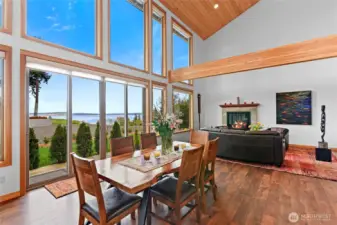 The dining area of the great room enjoys the views and the sliding doors for access to the patio beyond.