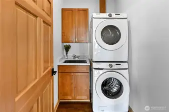 Utility room on the upper floor separates the two bedrooms.