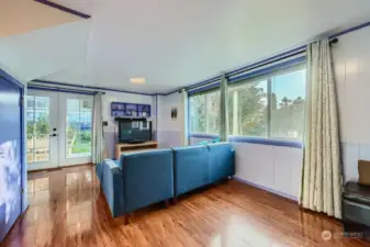 French doors off the family room lead to the covered patio and backyard.