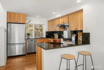 Guests can perch on stools while you cook in this gourmet kitchen.