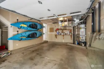 Don't miss the spacious garage on the bottom floor, with room for kayaks and extra storage under the stairs.