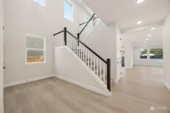 Entry showing Open Stair Rails and lots of Light