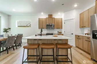 Photos shown are of a similar floor plan previously built in a different neighborhood (The Ridge in Blaine). Finishes and features may vary. Some items pictured reflect buyer-selected upgrades which are not included in the base price and may be added at an additional cost.