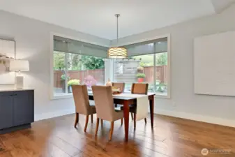 More custom... even includes remote controlled power window shades in the dining room and kitchen!