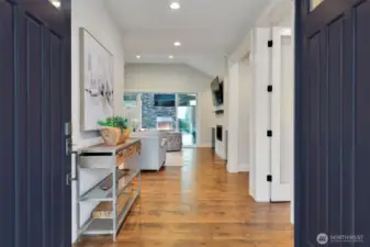 An inviting French door entry opens to reveal a bright, spacious interior, seamlessly extending into the family room and outdoor living beyond. Every detail exudes custom craftsmanship and luxury, from the elegant finishes to the 8-foot doors with four hinges, a testament to the home’s superior quality. A true distinction of exclusivity and thoughtful design, setting this residence apart from the rest.