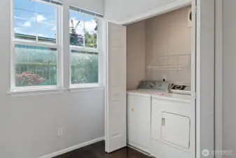Easy access washer dryer on main level of kitchen