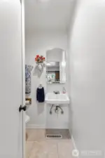 Three quarter bathroom off the kitchen garage entrance