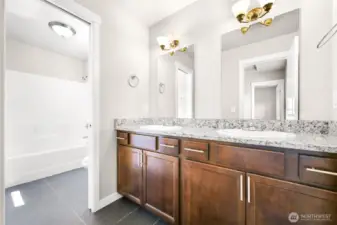 Upstairs bathroom with double sinks