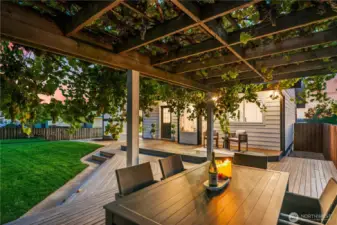 Covered deck with vining grapes