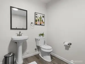 Half bath with plenty of room to turn into a primary ensuite