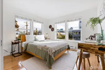 Featuring beautiful light in corner guest bed/office flex room.