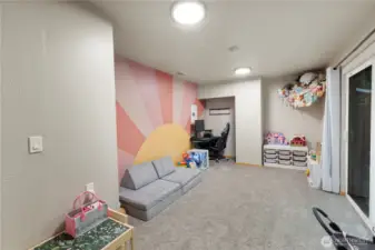 This area could be a great rec-room, office, play room or even a place for the MIL to stay when visiting!