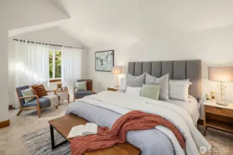 Light and bright primary suite with vaulted ceilings, space  for a king size bed with plenty of room to spare!