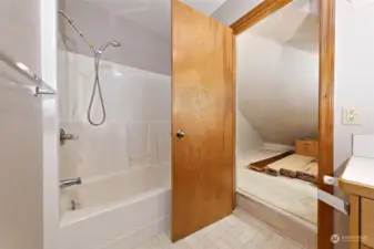 2nd upstairs bathroom, leading into a HUGE closet/storage space.