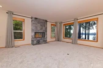 Beautiful living room with propane fireplace, with that fantastic view