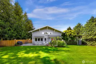 Expansive, fully fenced back yard