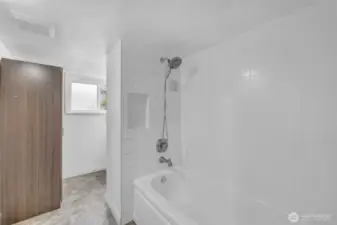Lower level Bathroom with tub and shower
