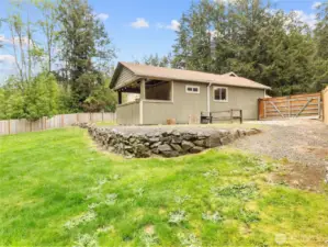 Great additional storage in the outbuilding, located in the backyard.