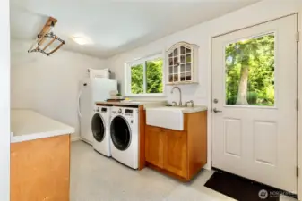 Utility/Mudroom conveniently located nearest the barn, driveway & greenhouse