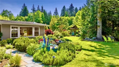 Professionally landscaped with deer-resistant materials.