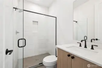 Bathroom in Guest Suite | Similar home for demonstration purposes only.  Colors and features will vary.  You will choose your interior finishes at our award winning design studio.