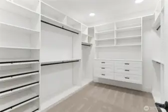 Primary Closet With Included Built-Ins | Similar home for demonstration purposes only.  Colors and features will vary.  You will choose your interior finishes at our award winning design studio.