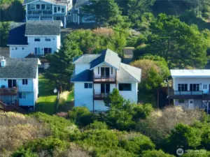 Covered decks on 2 upper levels.