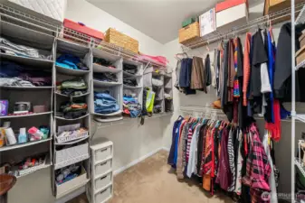 Primary closet with room for lots of storage