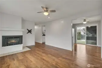 Cozy propane gas fireplace heats the entire living room & dining room areas.